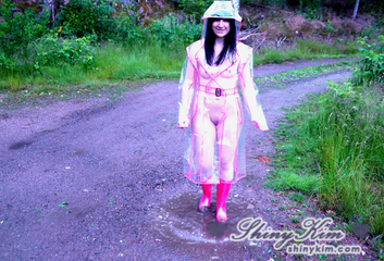 Wet games in my plastic raincoat and pink wellies